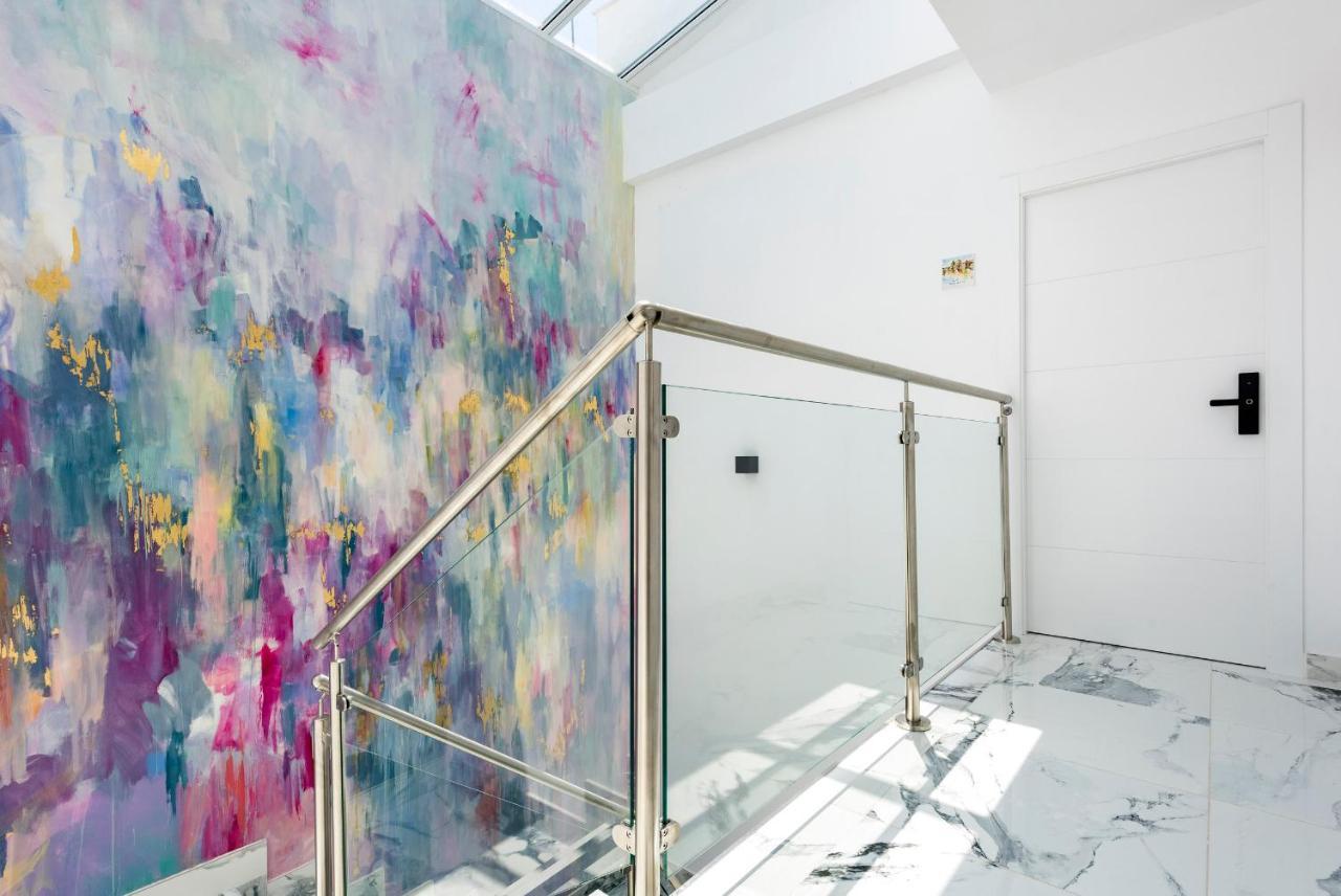 Andújar Quivir Apartamentos Deluxe Casa Del Arco מראה חיצוני תמונה