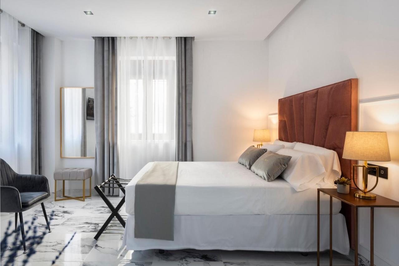 Andújar Quivir Apartamentos Deluxe Casa Del Arco מראה חיצוני תמונה