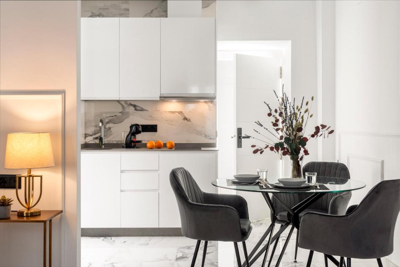 Andújar Quivir Apartamentos Deluxe Casa Del Arco מראה חיצוני תמונה
